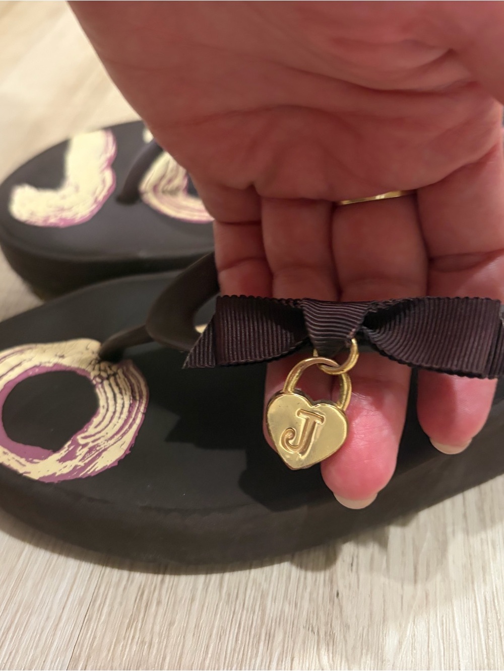 Ladies Black Flip Flop Sandals with Gold Heart Charm